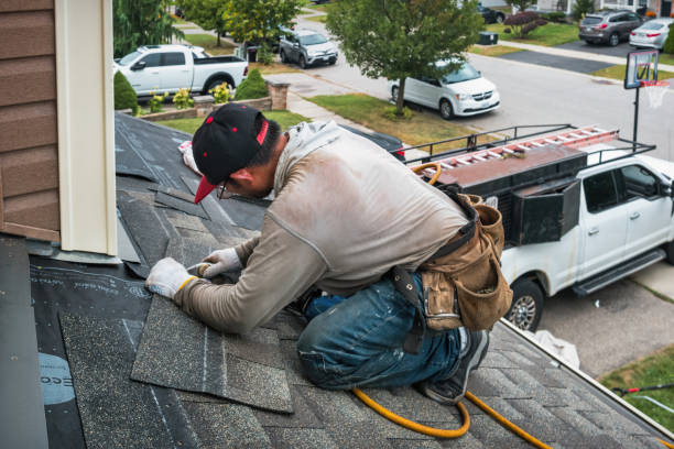 Professional Roofing technician working in La Salle, CO